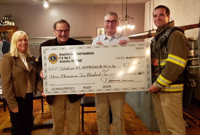 Lions check to fire dept